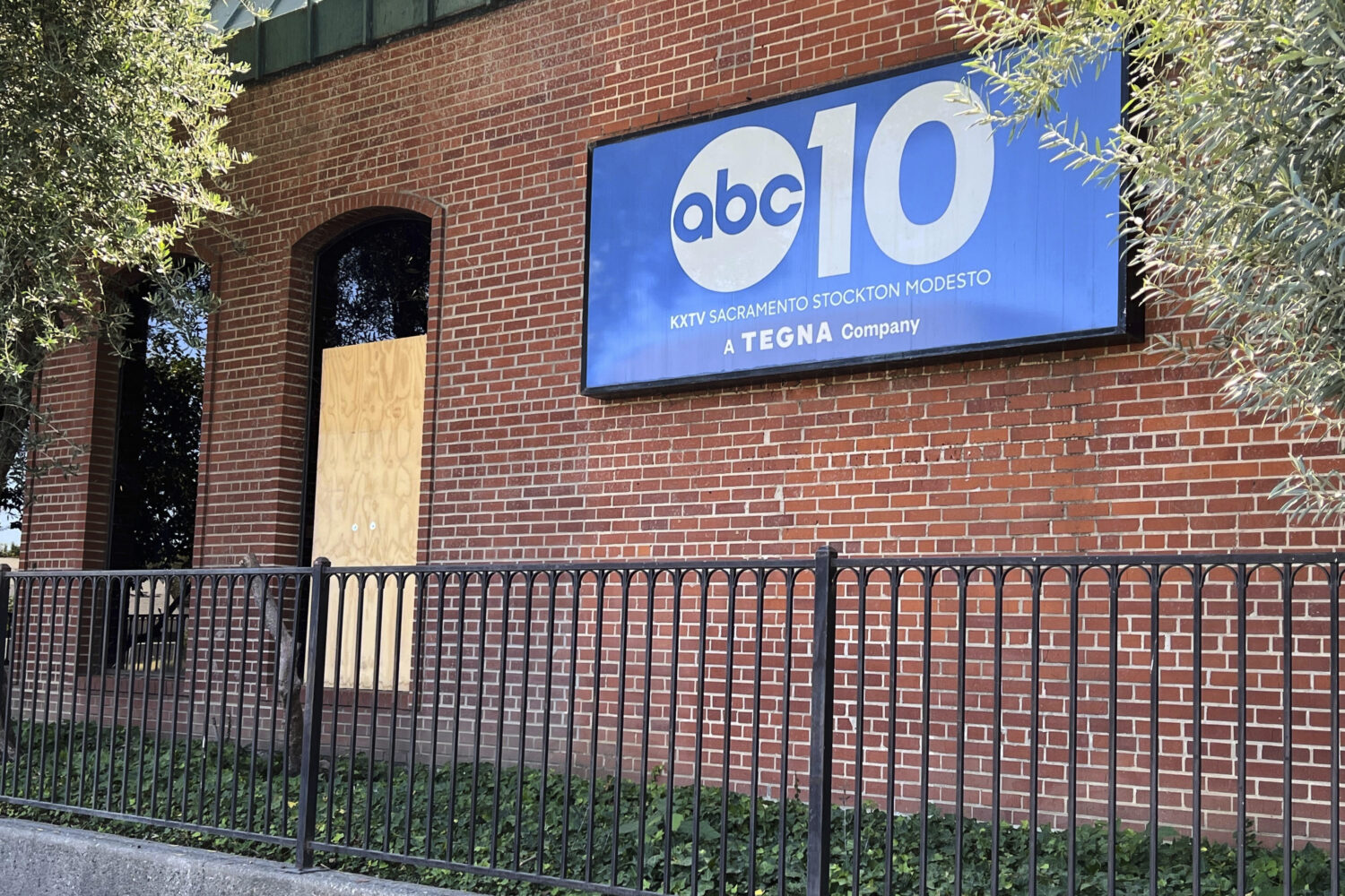 A boarded up window at the ABC10 building in Sacramento, Calif. is shown on Monday, Sept. 22, 2025,...