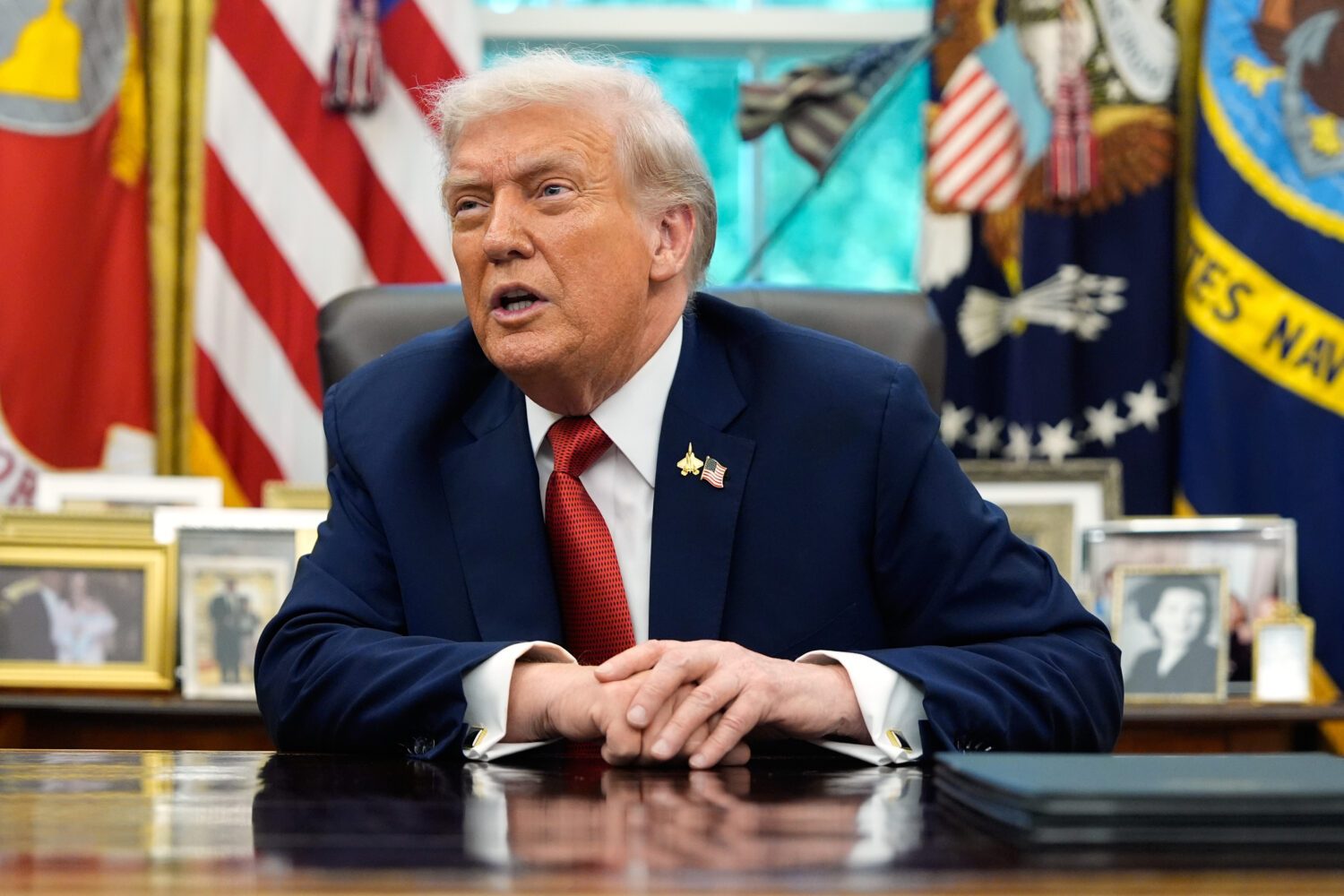 President Donald Trump speaks after signing an executive order regarding TikTok in the Oval Office ...