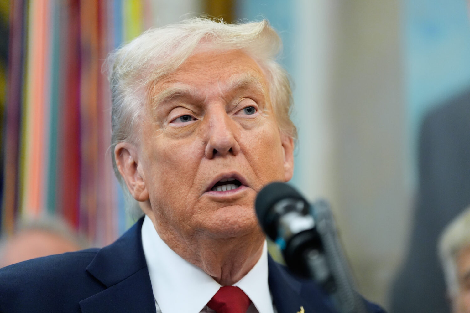 President Donald Trump speaks in the Oval Office of the White House, Tuesday, Sept. 30, 2025, in Wa...