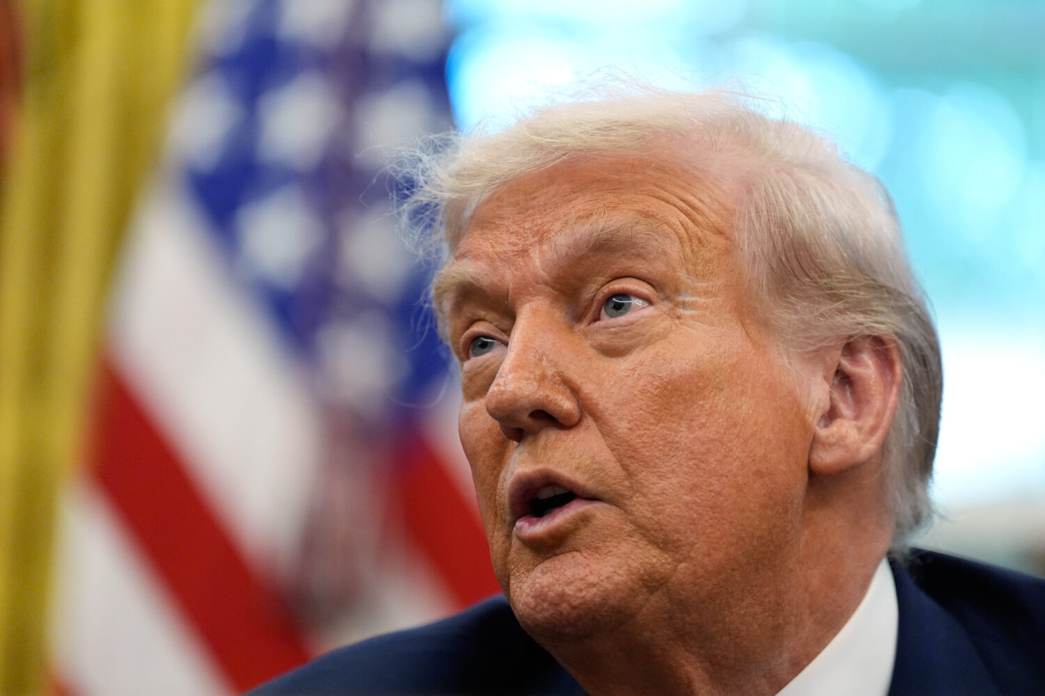 President Donald Trump speaks to reporters after signing an executive order regarding TikTok in the...