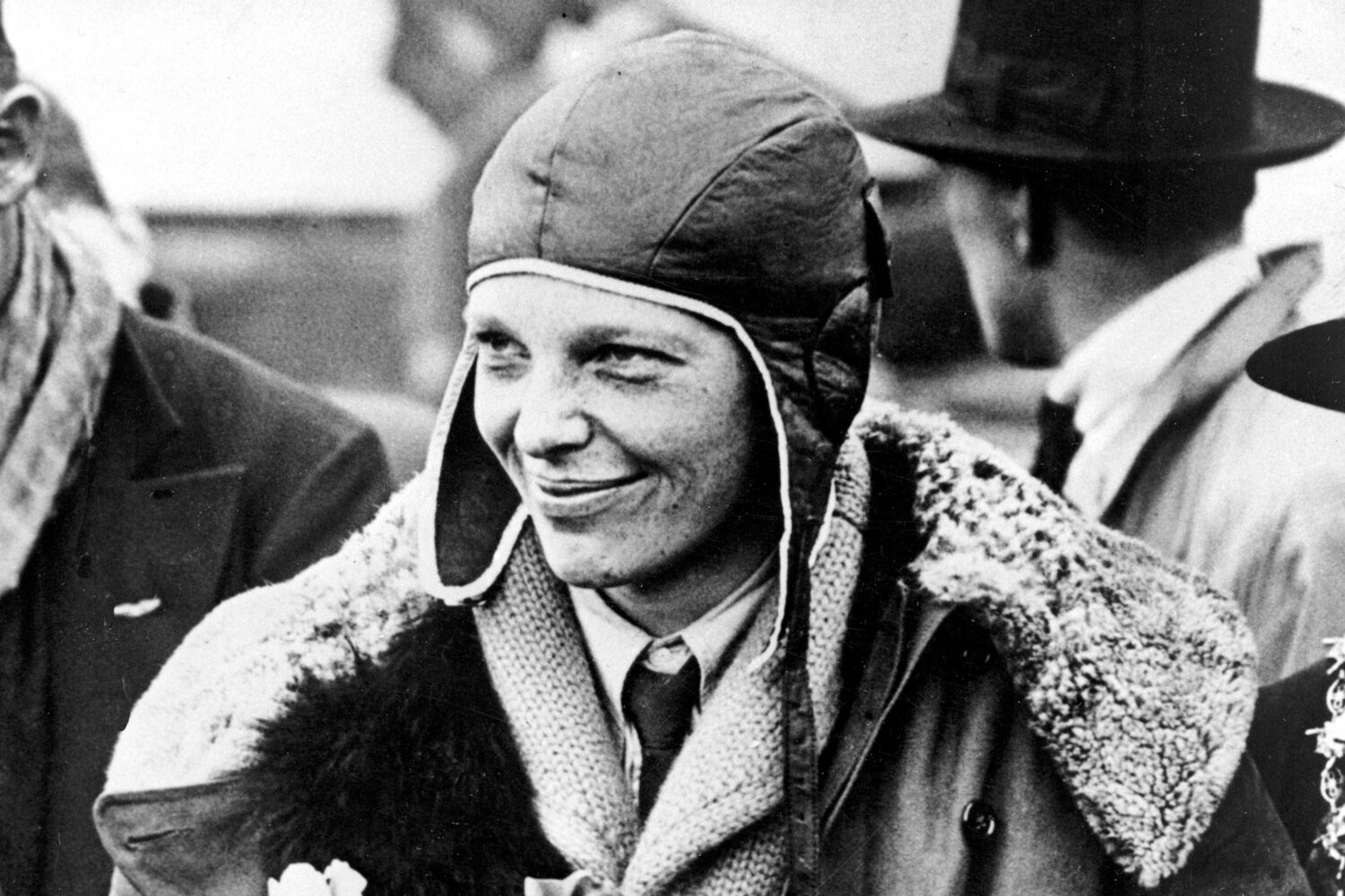 FILE - Amelia Earhart poses for photos as she arrives in Southampton, England, after her transatlan...