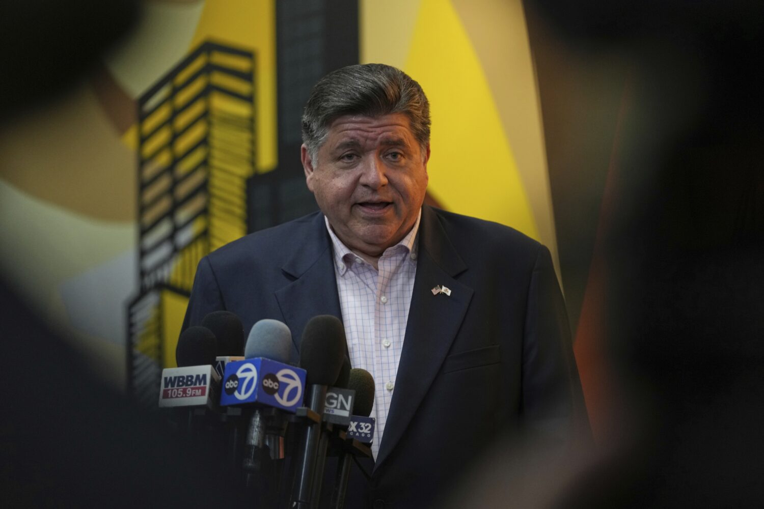 Illinois Gov. JB Pritzker speaks at a news conference after meeting with community violence interve...