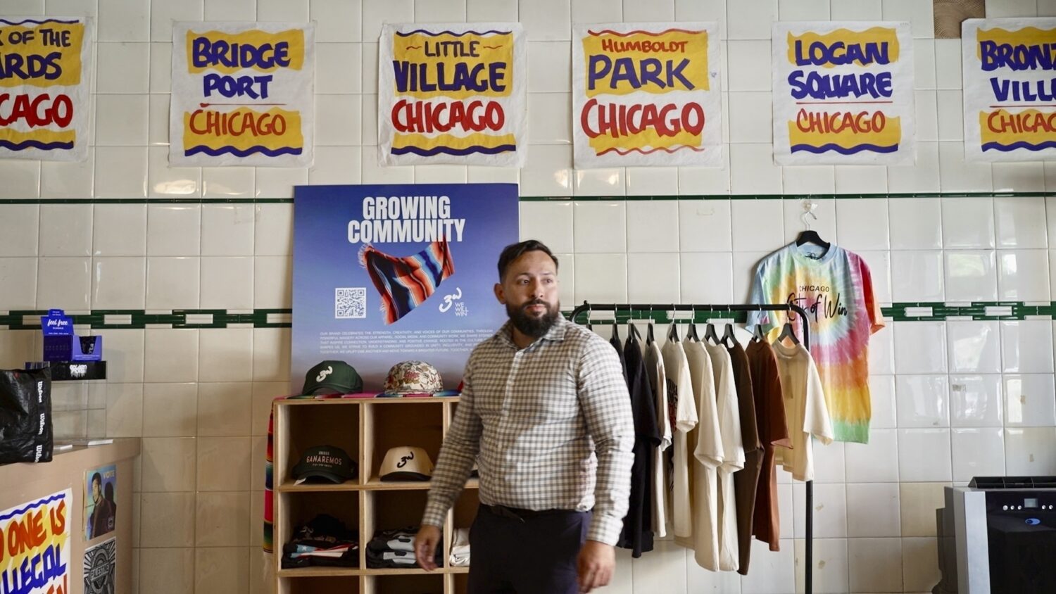 Fabio Fernandez arranges clothes for his residency at Definitive Selection clothing store, one of m...