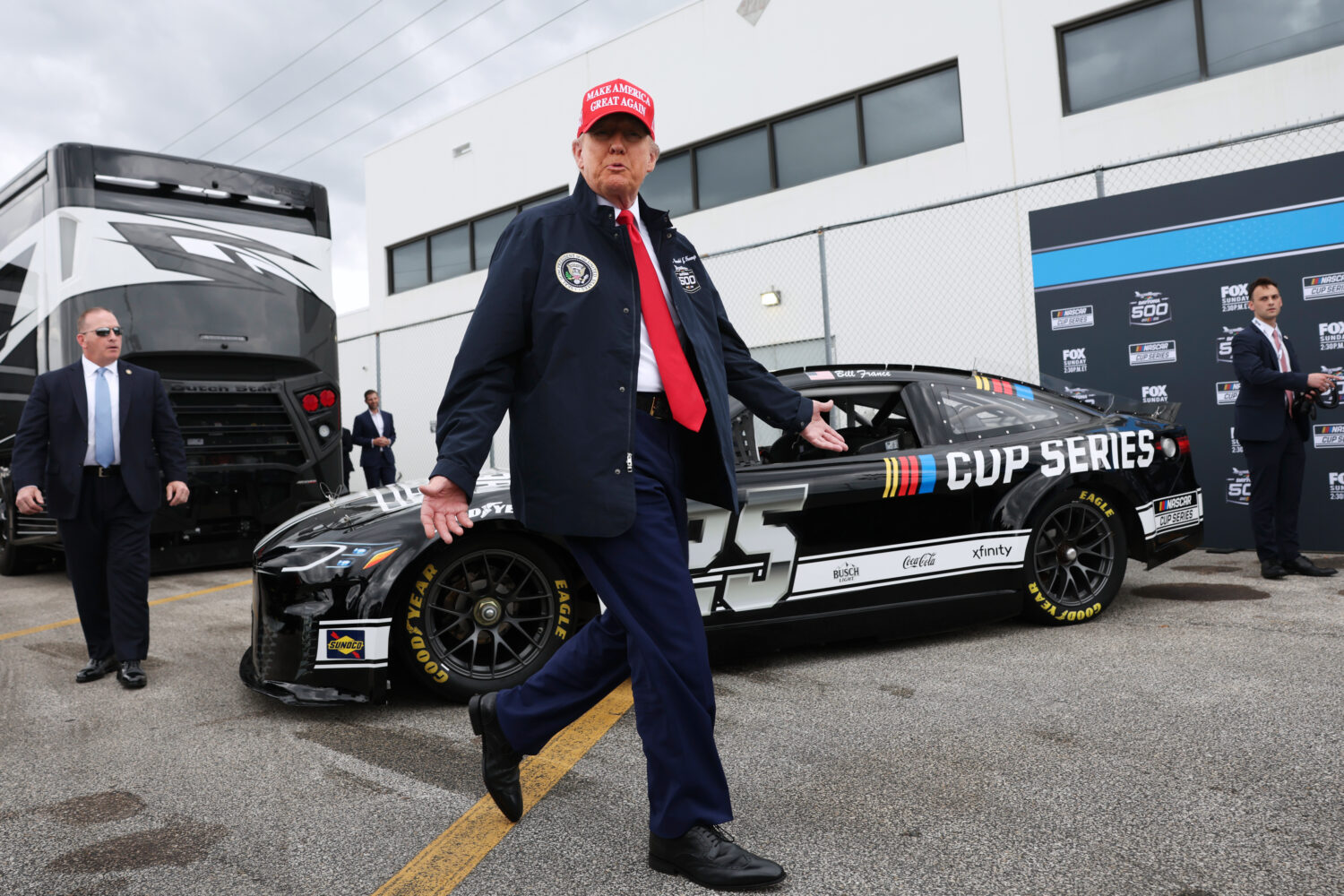 FILE - President Donald Trump attends the NASCAR Daytona 500 auto race at Daytona International Spe...