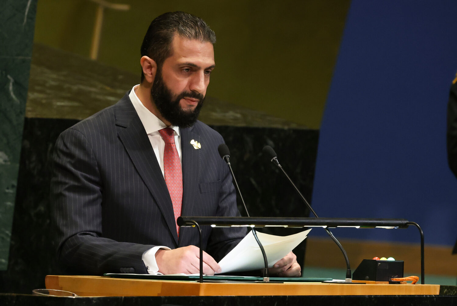 Syria President Ahmad Al-Sharaa speaks during the 80th session of the United Nations General Assemb...