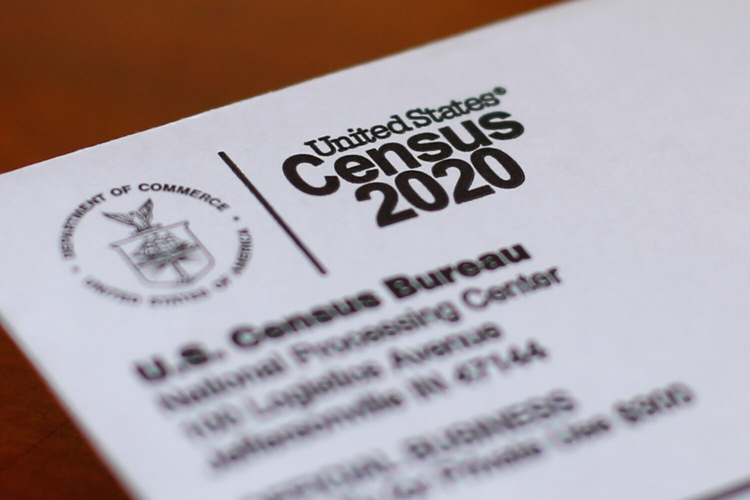 FILE - An envelope containing a 2020 census form mailed to a U.S. resident is seen in Detroit, on A...