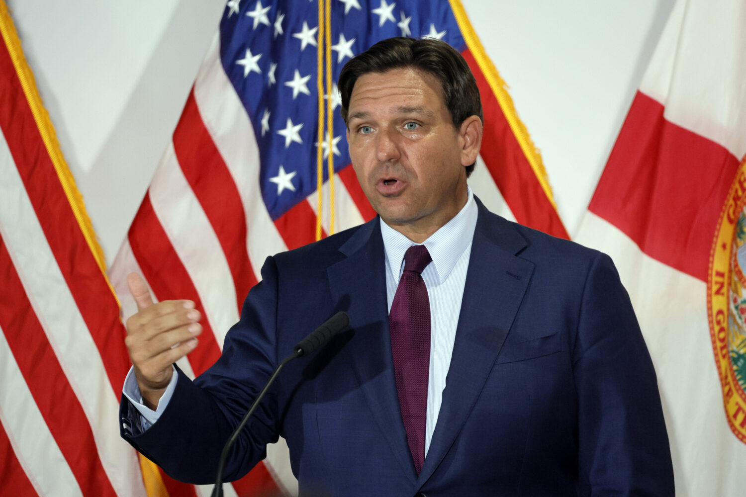 Florida Governor Ron DeSantis speaks during a news conference at Palm Beach State College in Lake W...