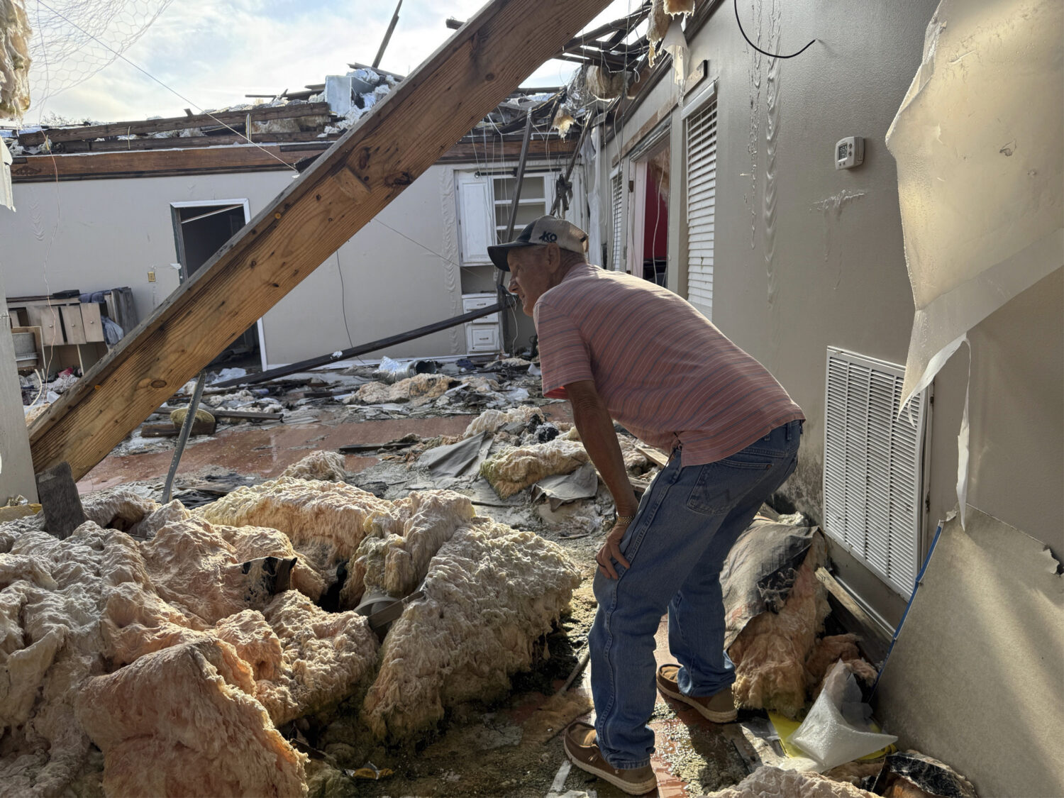Buddy Anthony surveys the remnants of his home on Thursday, Aug. 14, 2025, in Tylertown, Miss. (AP ...