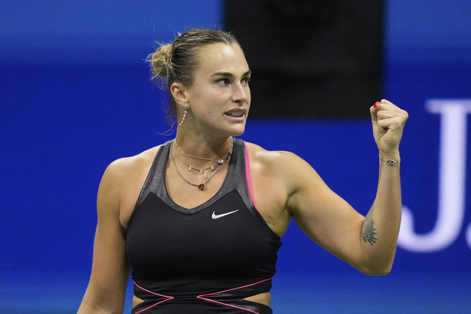Aryna Sabalenka, of Belarus, reacts after winning a match against Jessica Pegula, of the United Sta...