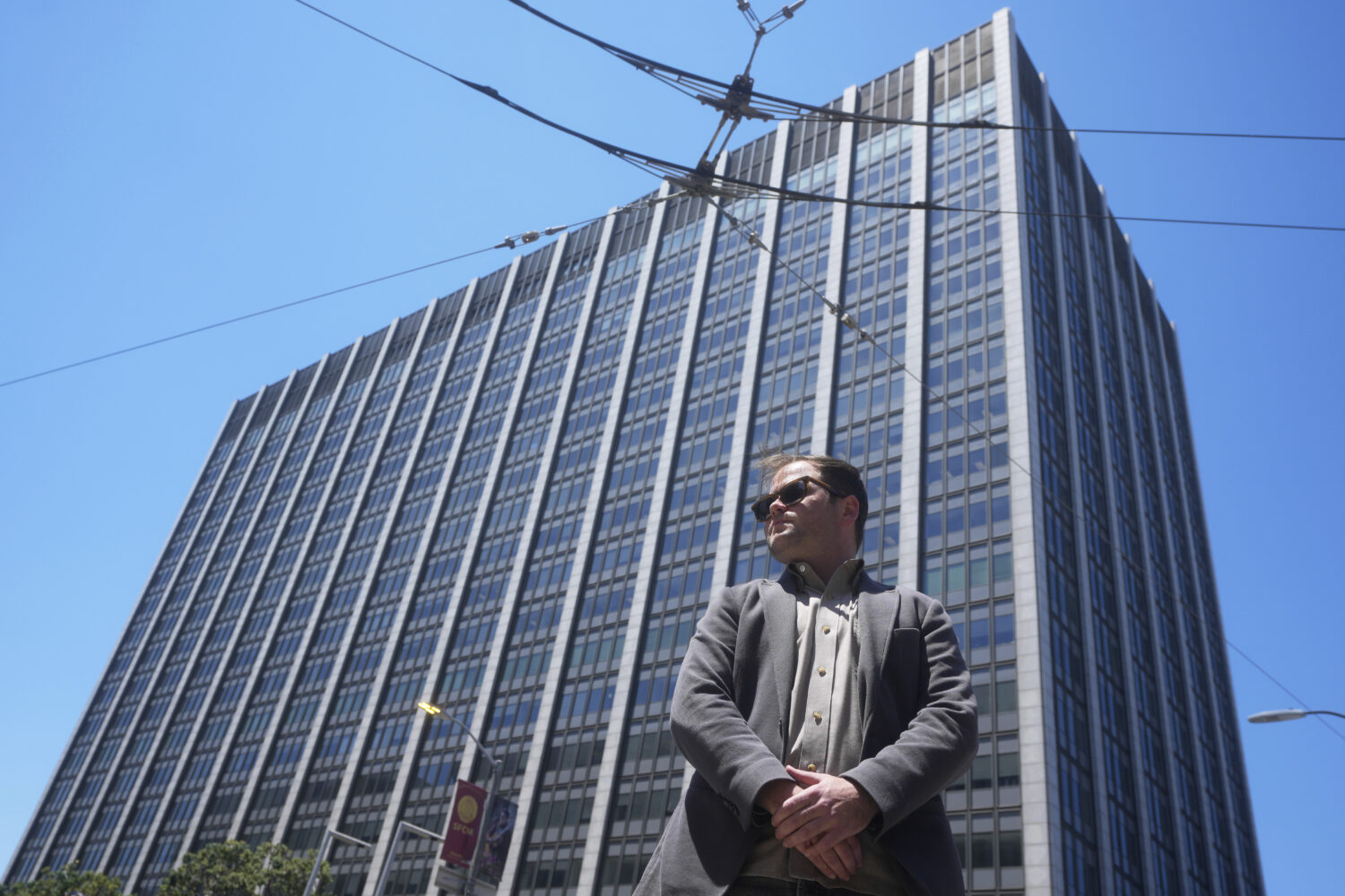 Marc Seawright poses for a photo outside of the Phillip Burton Federal Building and U.S. Courthouse...