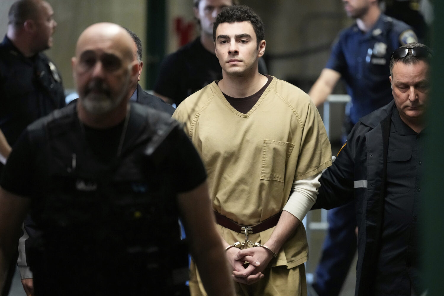 Luigi Mangione is escorted into Manhattan state court in New York, Tuesday, Sept. 16, 2025. (AP Pho...
