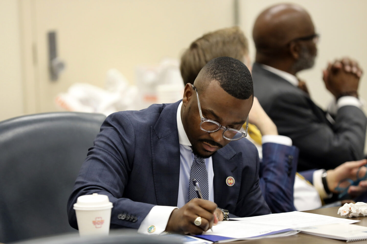 FILE - State Rep. Hamilton Grant, D-Columbia, takes notes during a meeting of the Legislative Black...