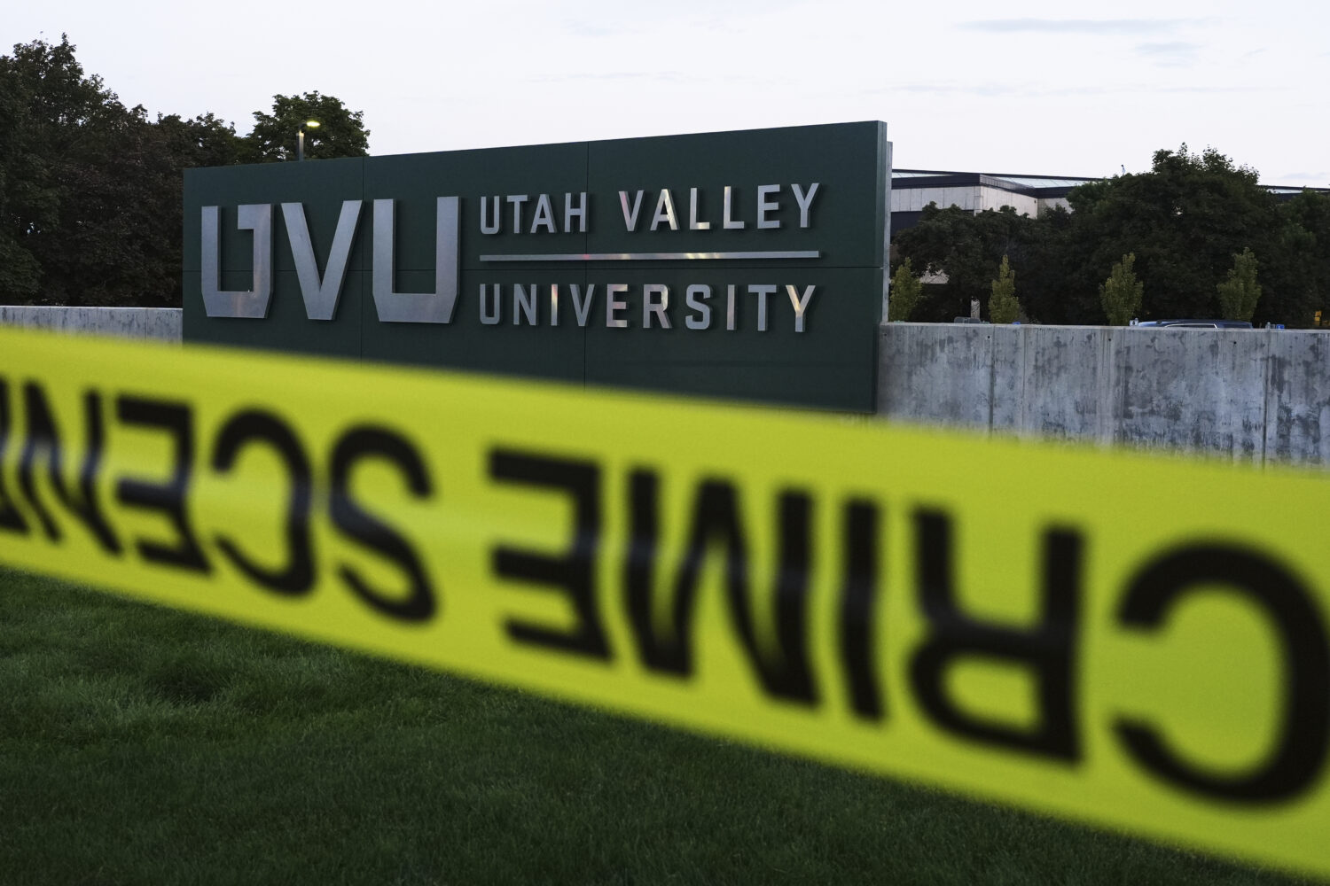 FILE - Crime scene tape surrounds Utah Valley University after Turning Point USA CEO and co-founder...