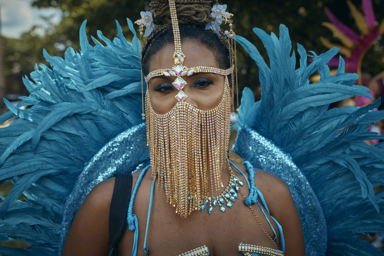 FILE - A reveler poses for a picture during the West Indian Day Parade on Sept. 2, 2024, in the Bro...