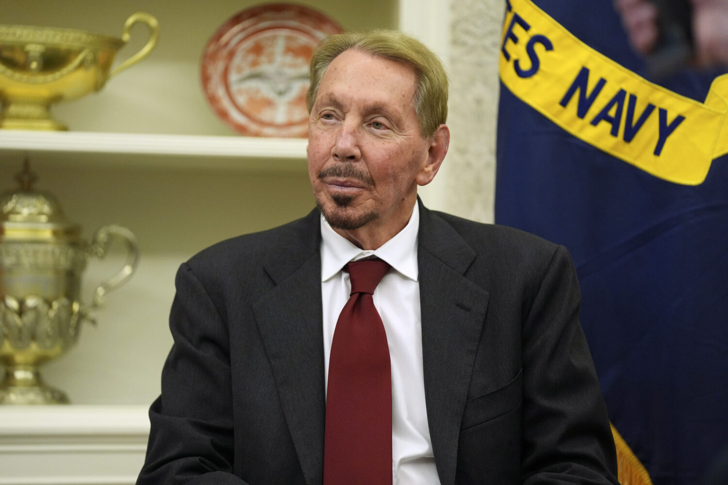 FILE - Larry Ellison, chairman and chief technology officer of Oracle Corporation, sits in the Oval...