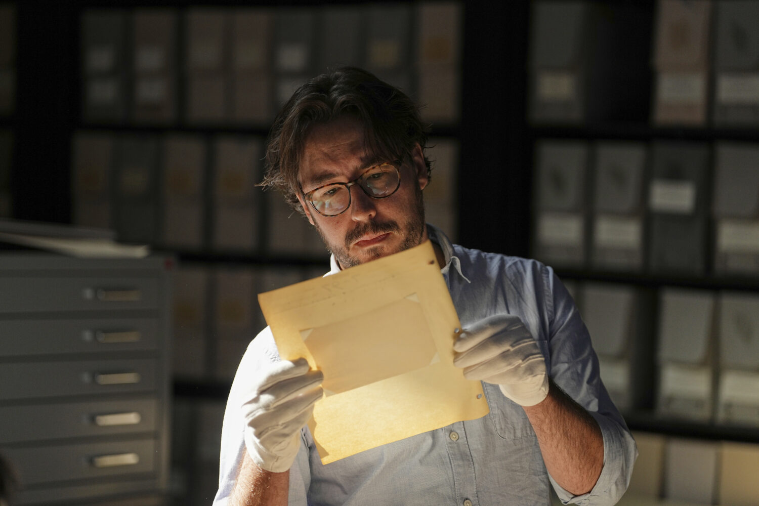 University of Victoria postdoctoral fellow Nathaniel Brunt views an image from a collection of phot...