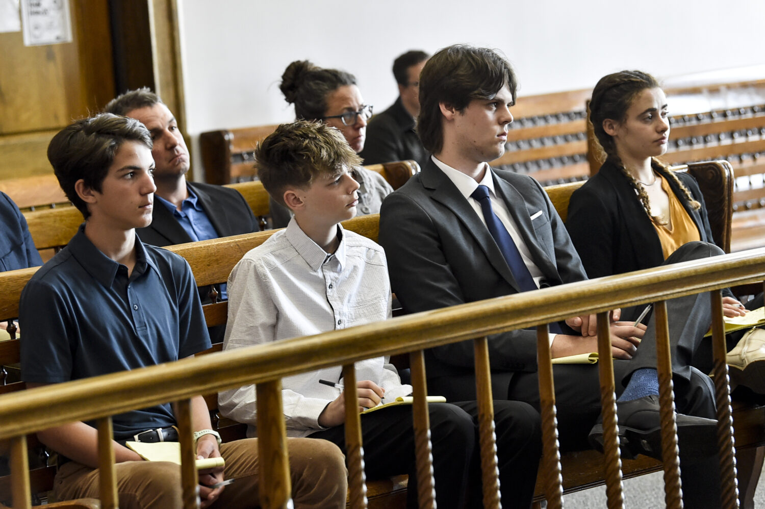 FILE - Plaintiffs in a climate lawsuit brought by children and young adults in Montana listen to ar...