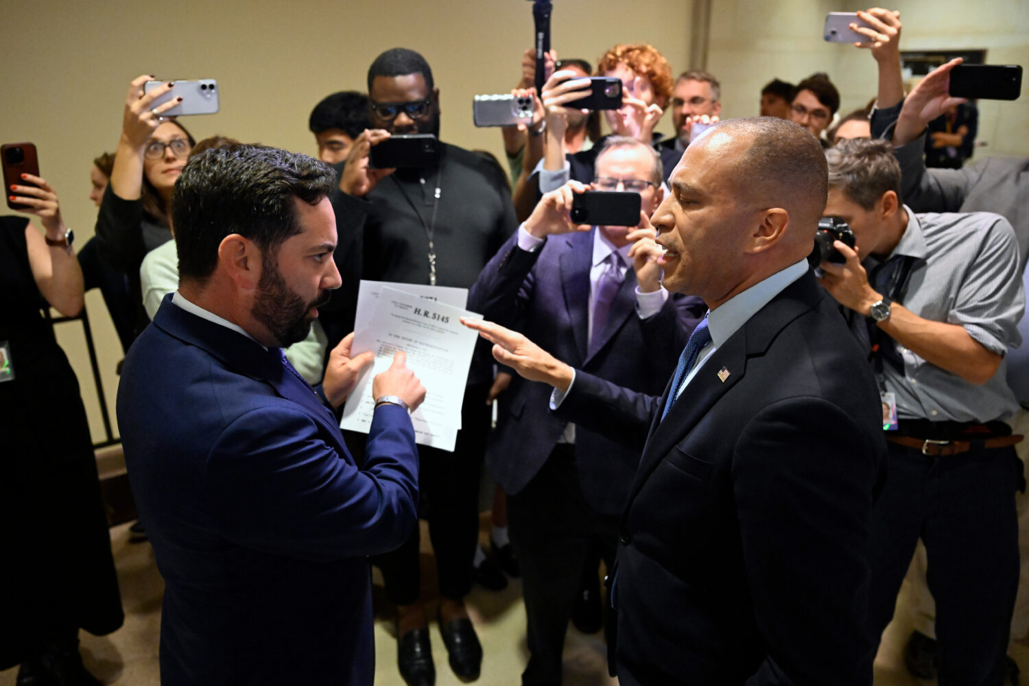 Rep. Michael Lawler, R-N.Y., left, confronts House Minority Leader Hakeem Jeffries, D-N.Y., in a he...