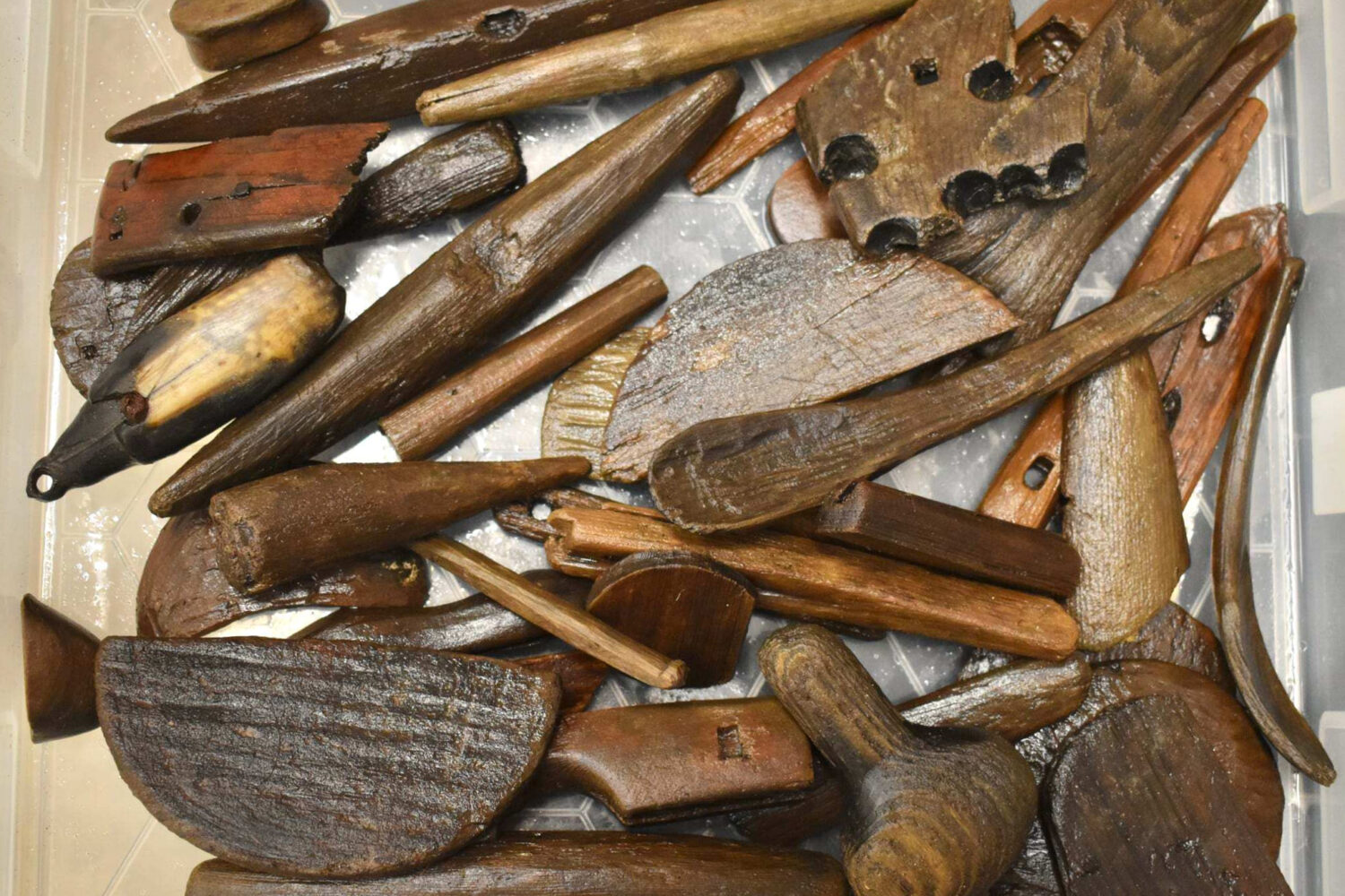 This photo provided by Richard Arden Knecht shows various tools, utensils and other artifacts that ...