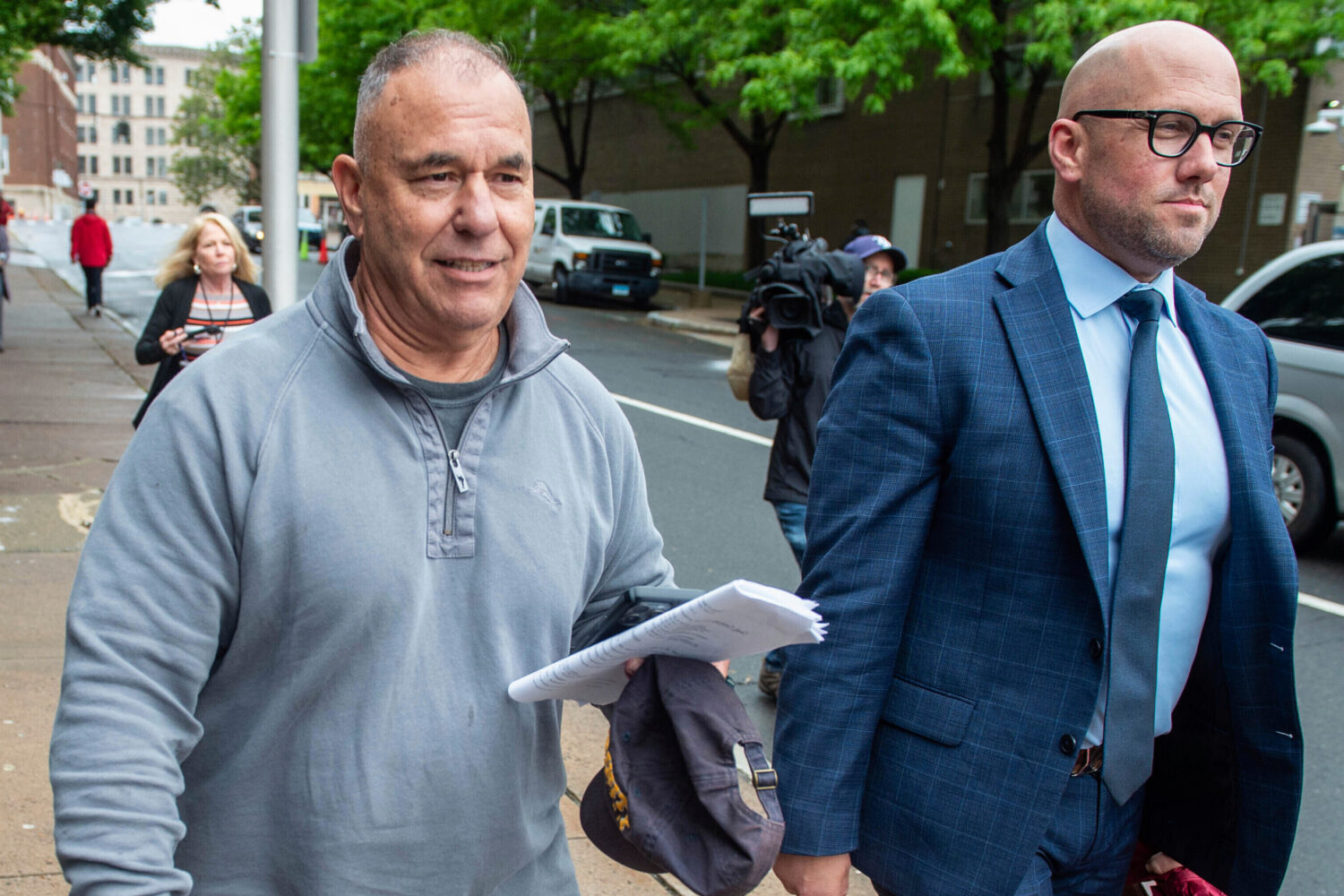 FILE - Former Connecticut deputy budget director Kosta Diamantis, left, accompanied by his lawyer V...