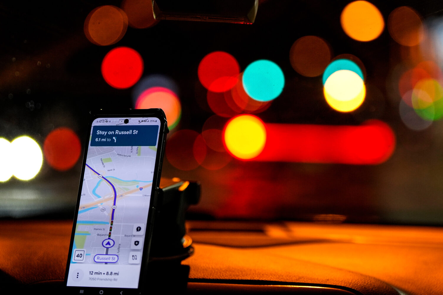 FILE - A Lyft driver takes a customer to the airport, Jan. 29, 2024, in Baltimore. (AP Photo/Mike S...