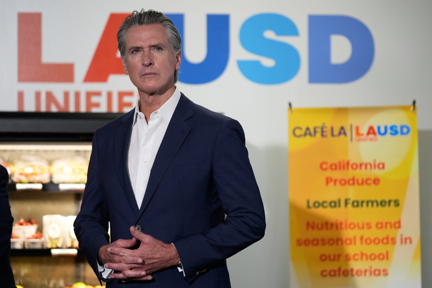 Gov. Gavin Newsom prepares to speak at a news conference at Belvedere Middle School, Wednesday, Oct...