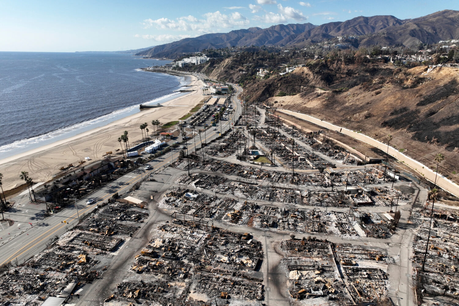 FILE - An aerial view shows the devastation left by the Palisades Fire in the Pacific Palisades sec...