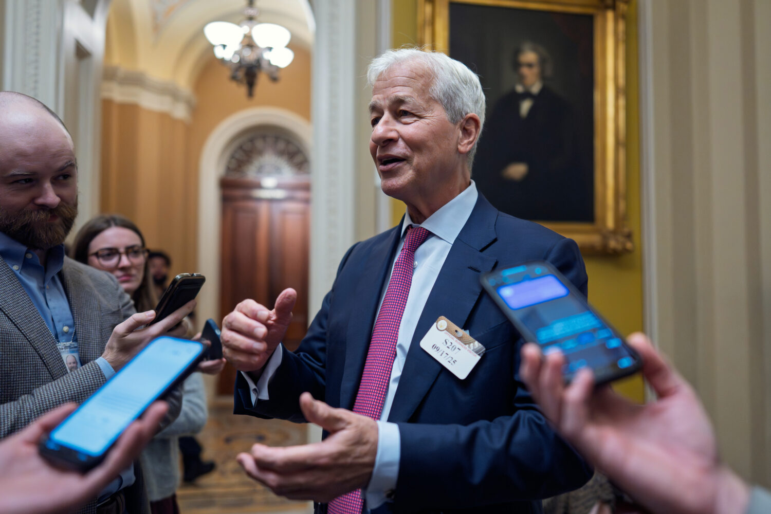 Jamie Dimon, CEO and chairman of JPMorgan Chase, pauses to talk to reporters after lunch with Repub...