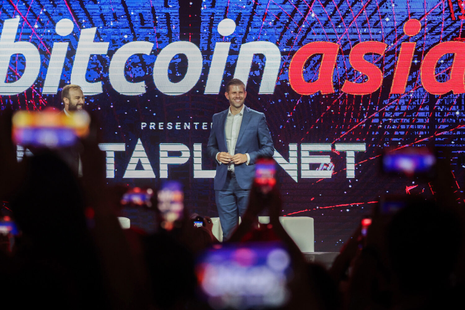 FILE - Eric Trump, Executive Vice President of the Trump Organization reacts during the Bitcoin Asi...