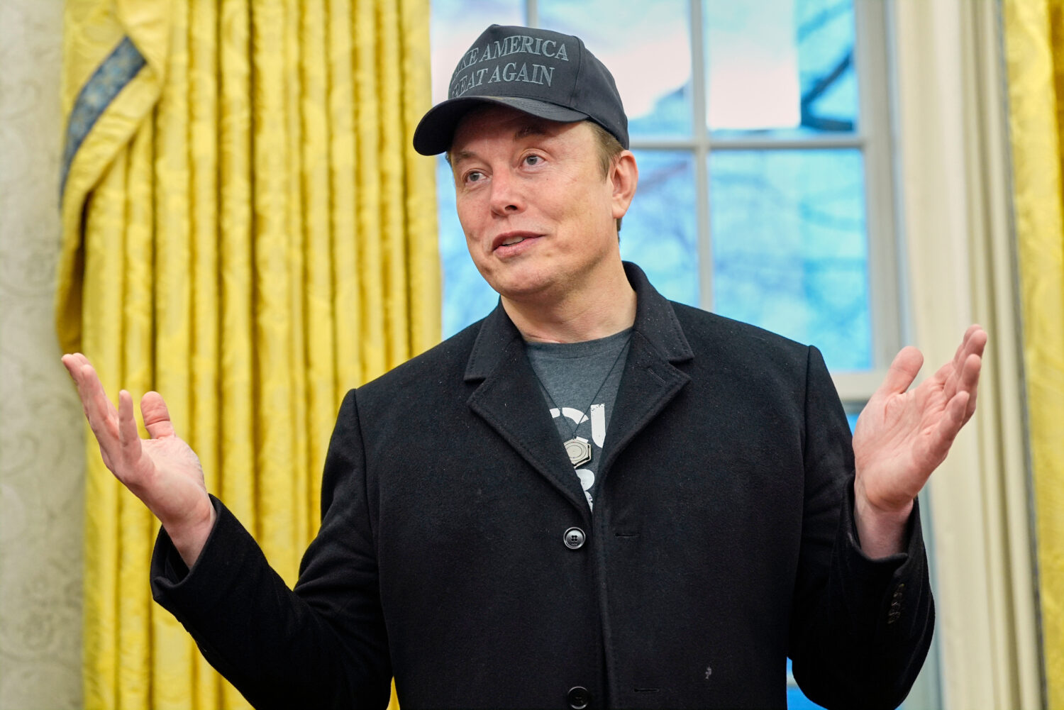 FILE - Elon Musk speaks during an event with President Donald Trump in the Oval Office at the White...