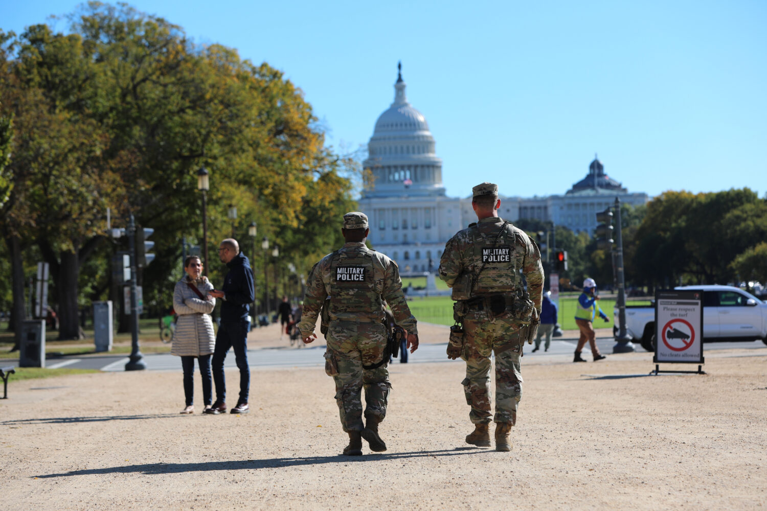 National Guard soldiers patrol on the National Mall near the U.S. Capitol, Friday, Oct. 17, 2025, i...