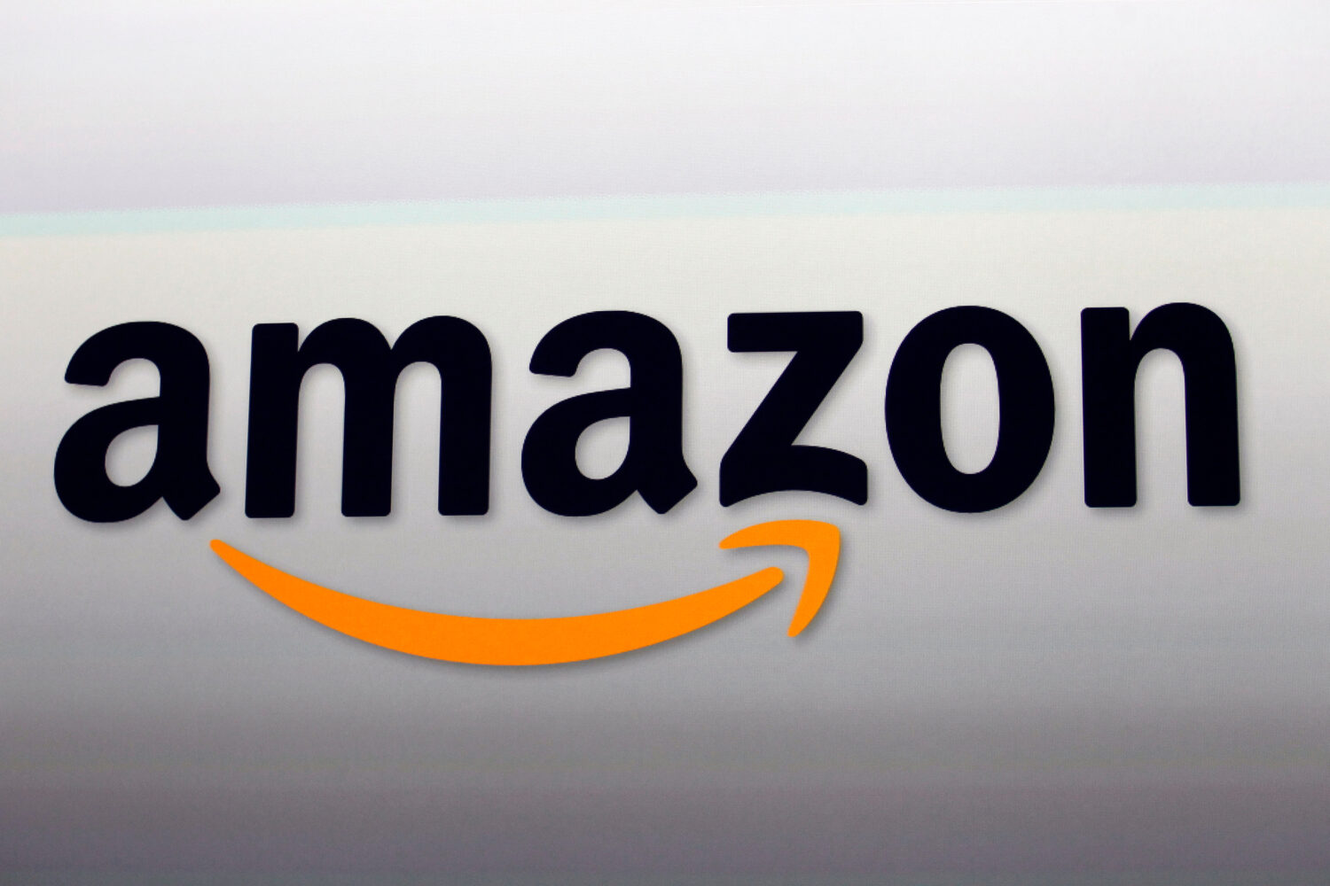 FILE - This Sept. 6, 2012, file photo, shows the Amazon logo. (AP Photo/Reed Saxon, File)Credit: AS...