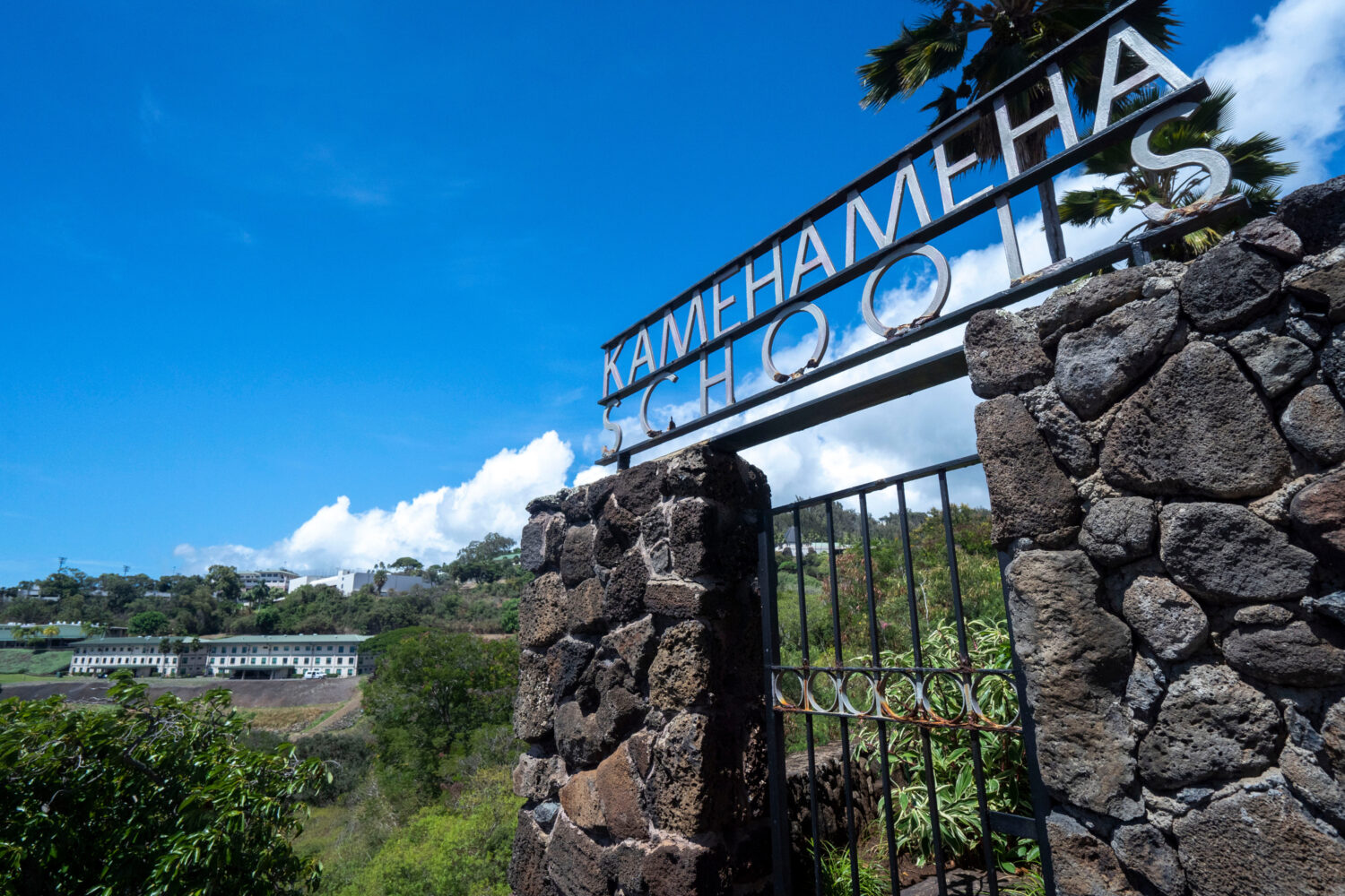 FILE - The entrance sign of Kamehameha Schools stands in front of the campus in Honolulu, Sept. 11,...