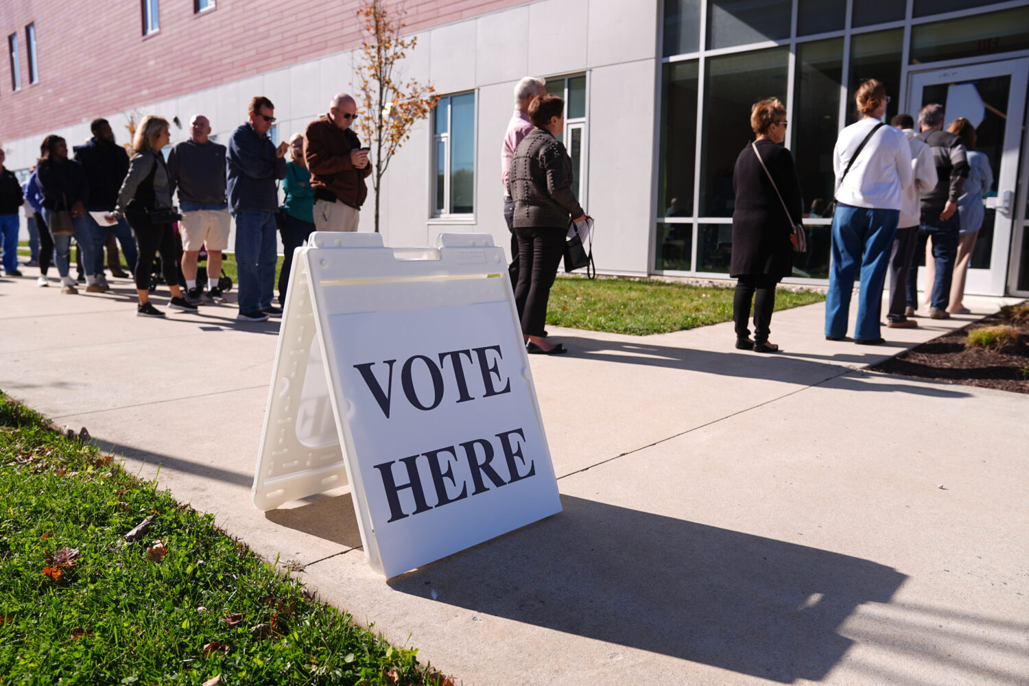 FILE - Voters wait in line to cast there ballot at a polling place at Rowan College in Mt Laurel, N...