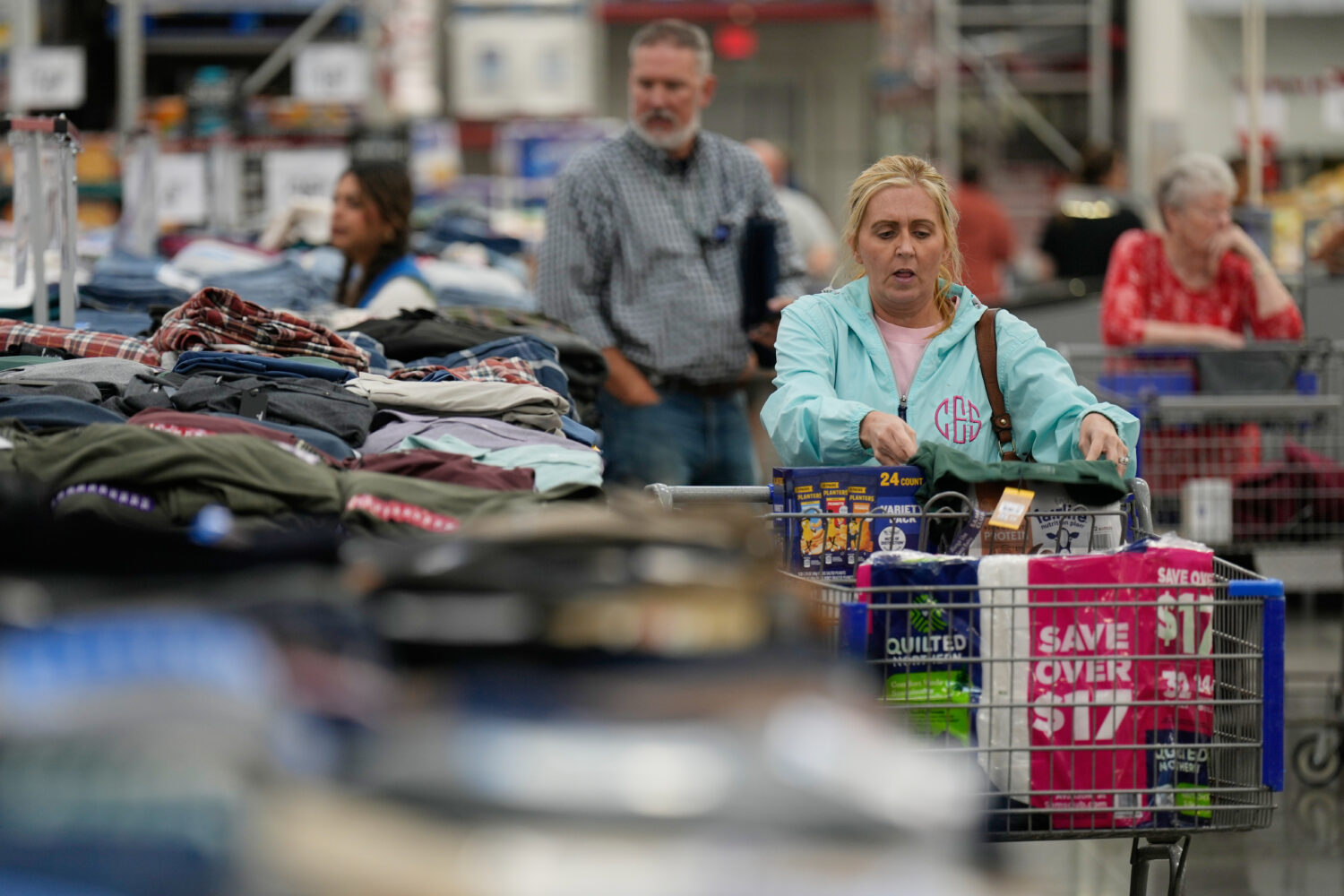 People shop for clothing at a Sam's Club, Wednesday, Sept. 24, 2025, in Bentonville, Ark. (AP Photo...