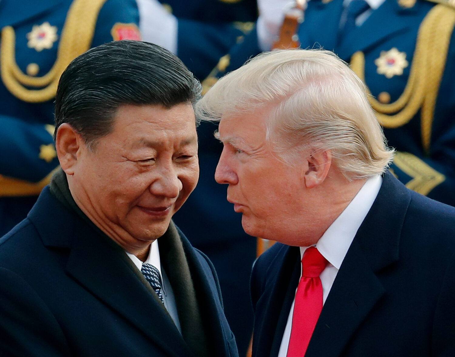 FILE - In this Nov. 9, 2017, file photo, U.S. President Donald Trump, right, chats with Chinese Pre...