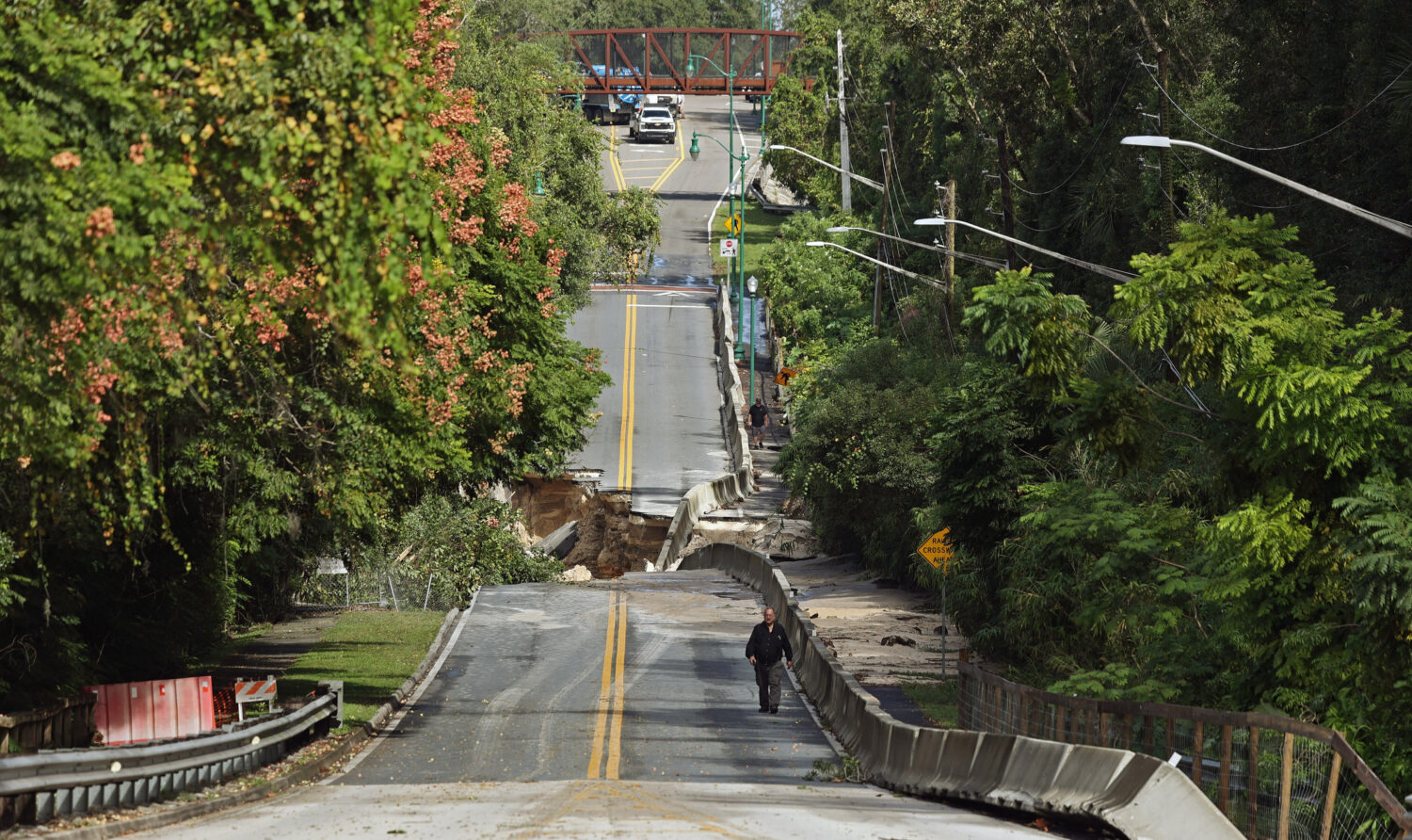 Washed out section of Donnelly Street in Mount Dora — Flooding damage in Lake County after torren...