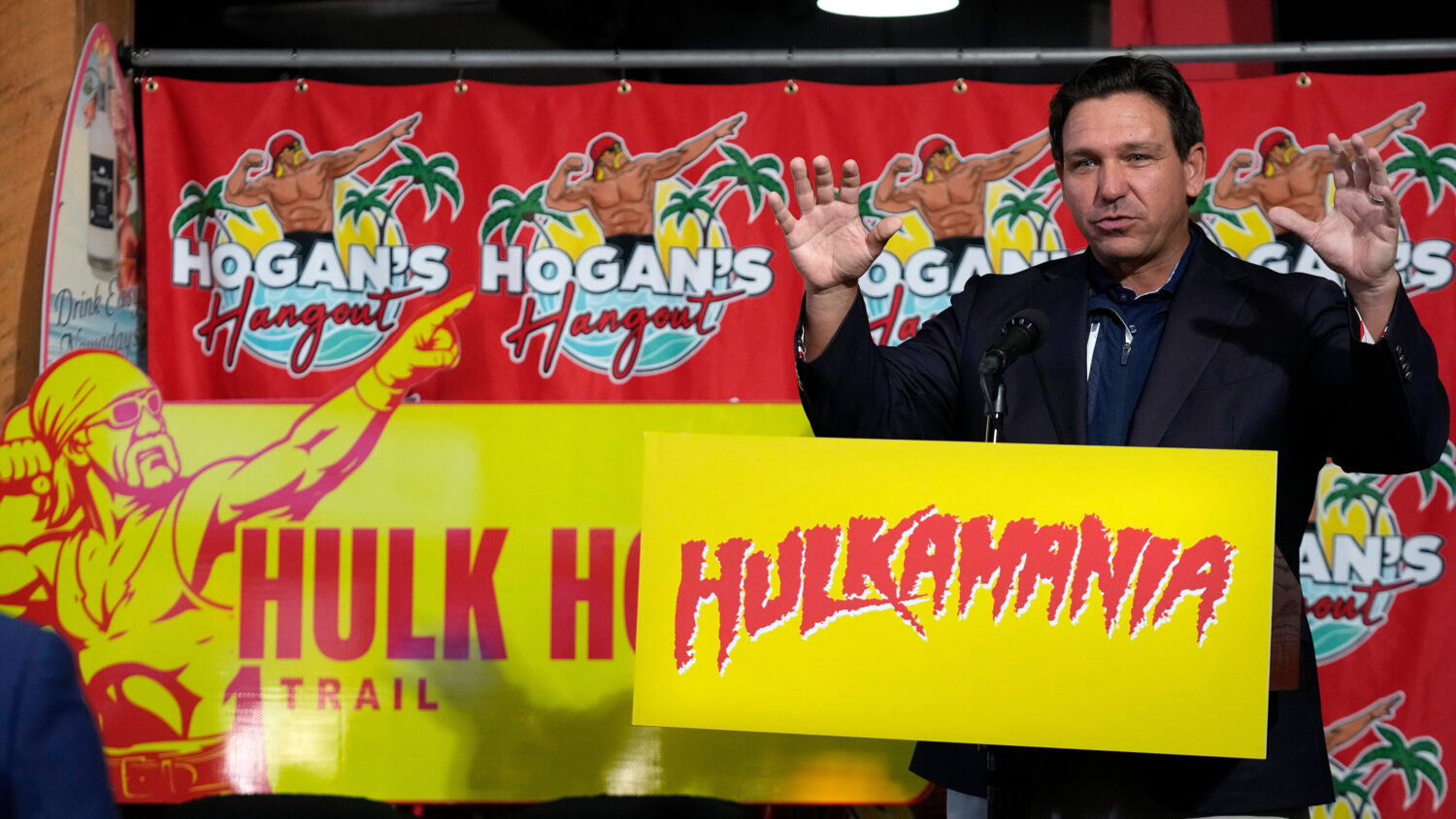 Florida Gov. Ron DeSantis gestures during a news conference after naming a trail in honor of wrestl...