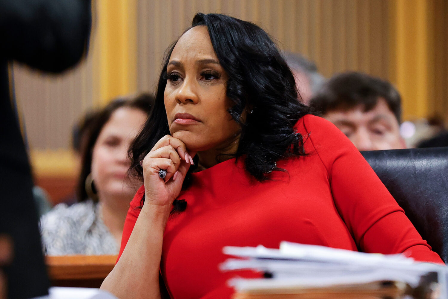 FILE - Fulton County District Attorney Fani Willis looks on during a hearing on the Georgia electio...