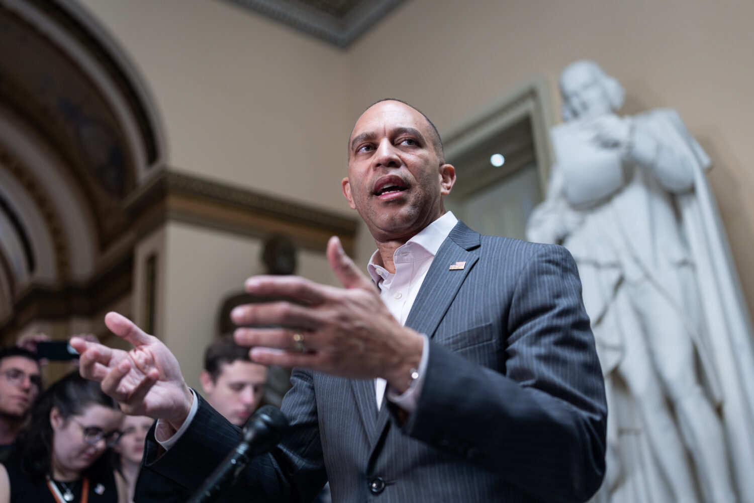 House Minority Leader Hakeem Jeffries, D-N.Y., meets with reporters near the closed House chamber o...