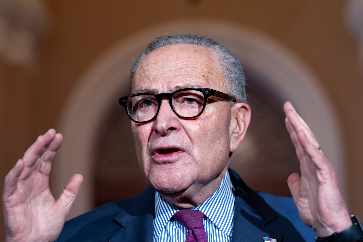 Senate Minority Leader Chuck Schumer, D-N.Y., expresses his frustration as he speaks to reporters o...
