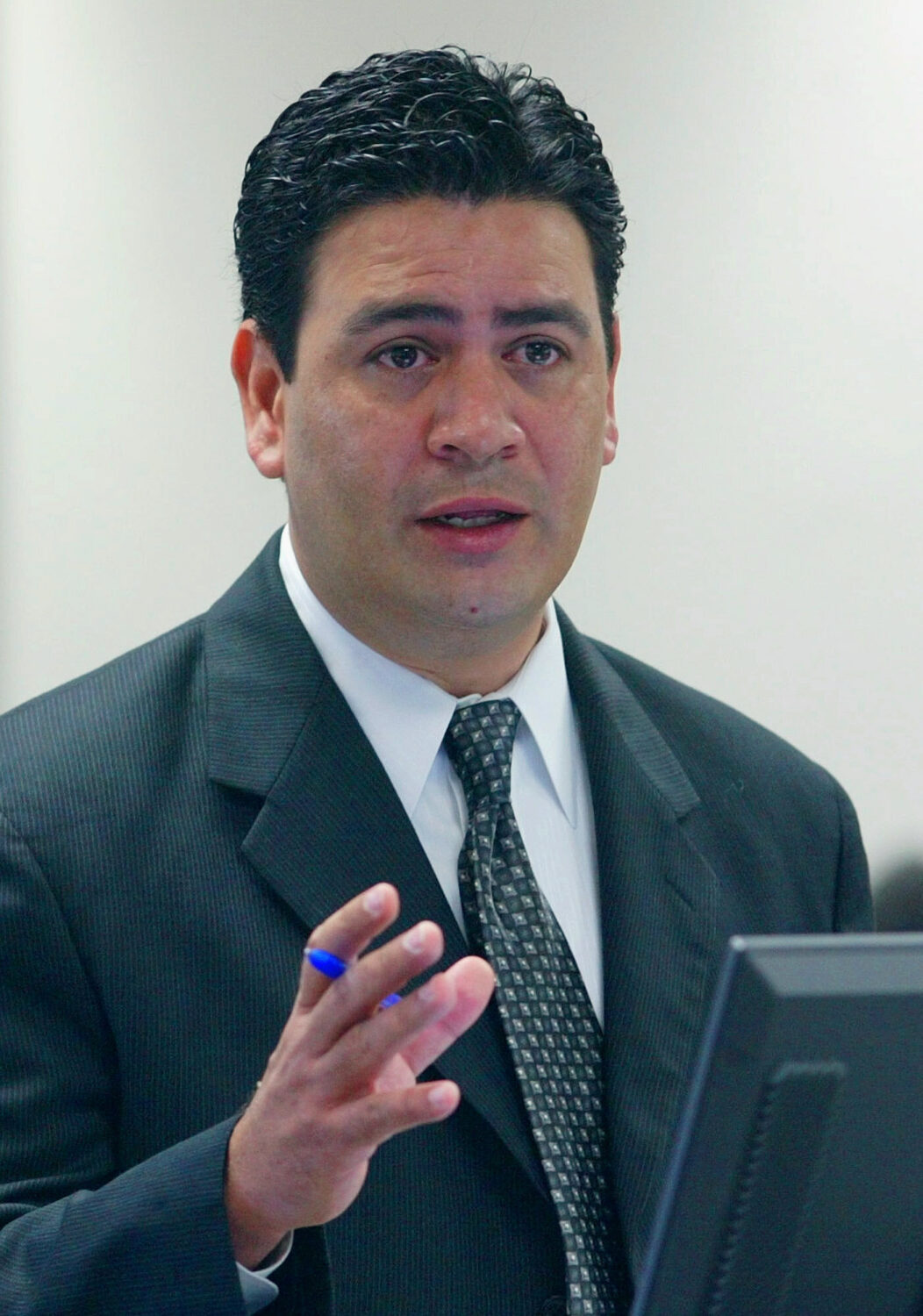 FILE - David Herrera Urias, attorney for plaintiffs, questions a witness during a trial Aug. 26, 20...