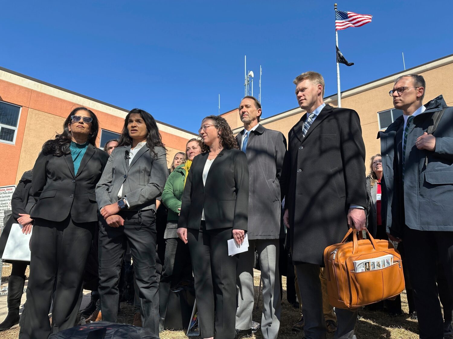 FILE - Greenpeace representatives talk with reporters outside the Morton County Courthouse March 19...