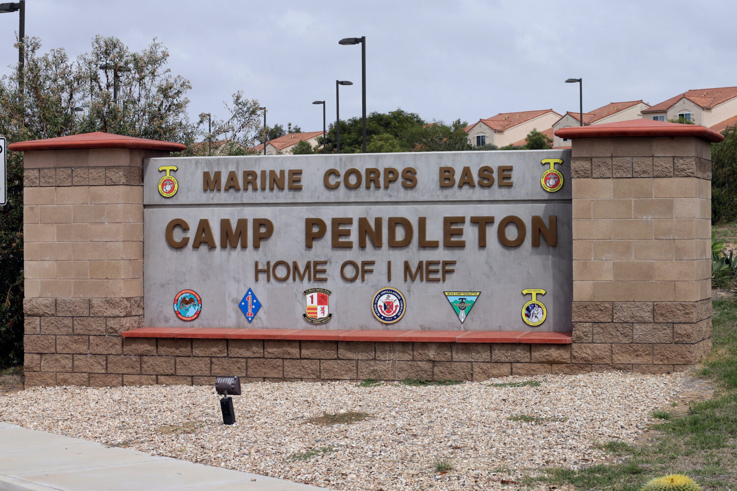 FILE - The entrance to Marine Corps base Camp Pendleton is seen on Sept. 22, 2015, in Oceanside, Ca...
