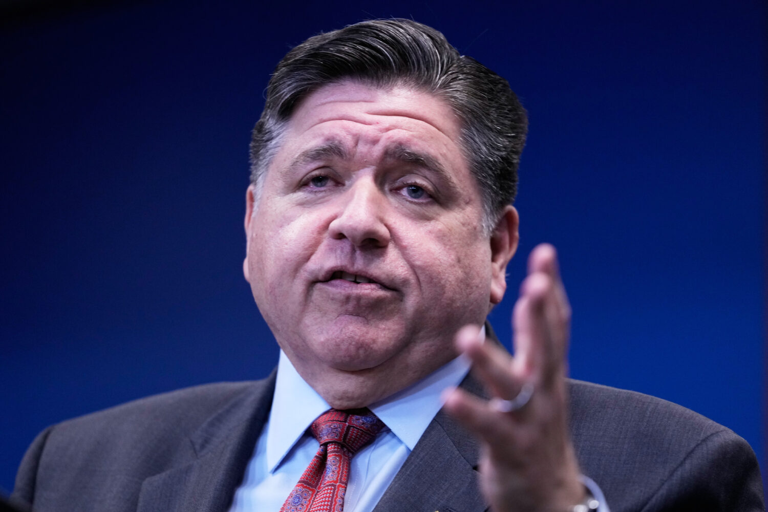 Governor JB Pritzker talks to media at a news conference in Chicago, Monday, Oct. 6, 2025. (AP Phot...