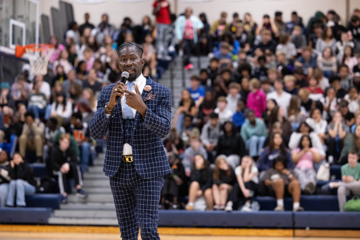 Ian Roberts, superintendent of Des Moines Public Schools, speaks to students at Theodore Roosevelt ...