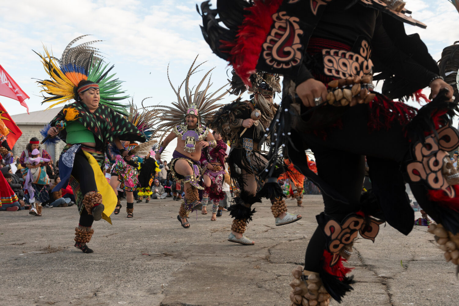 Aztec dancers perform during a sunrise gathering on Indigenous Peoples Day on Alcatraz Island on Mo...