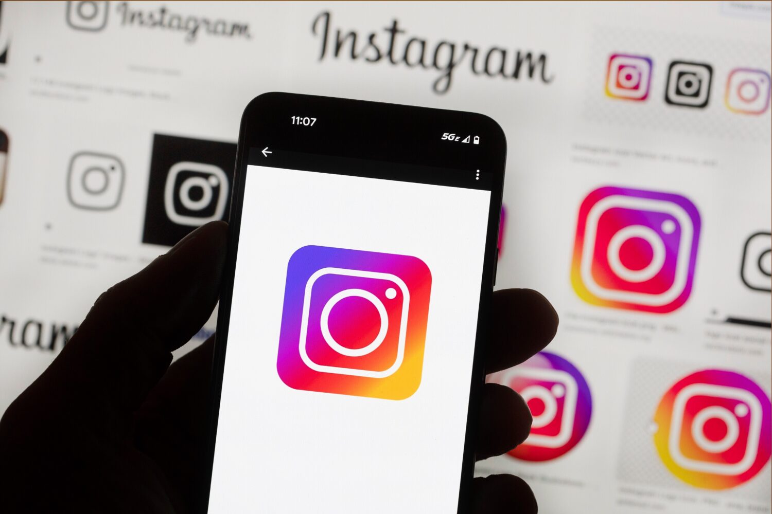 FILE - The Instagram logo is seen on a cell phone in Boston, Oct. 14, 2022. (AP Photo/Michael Dwyer...