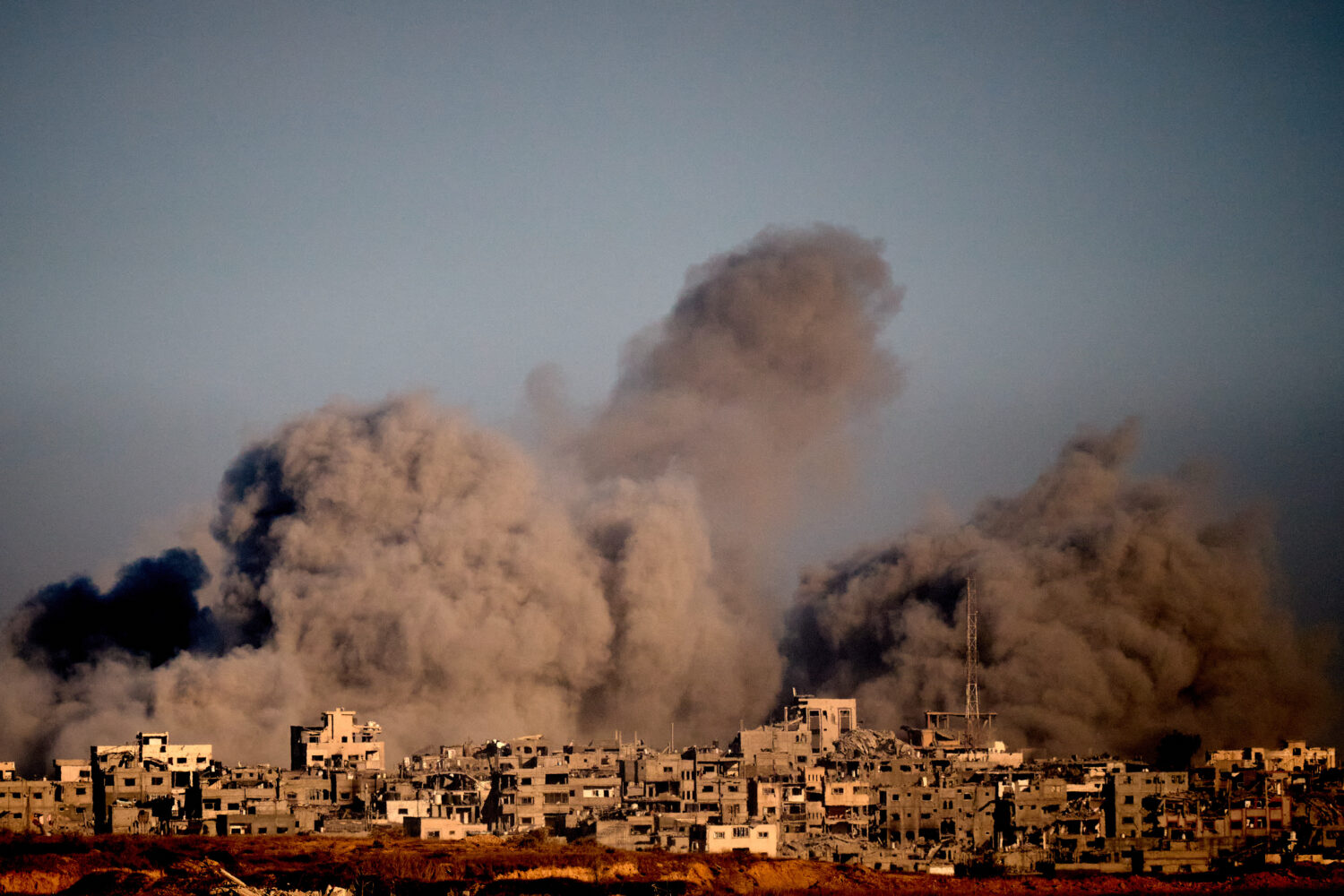 Smoke rises to the sky following an Israeli military strike in the northern Gaza Strip, as seen fro...