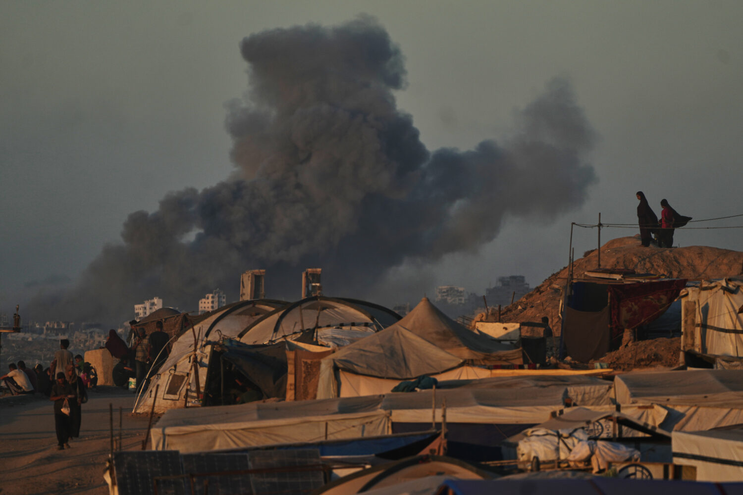 Smoke rises following an Israeli military strike in Gaza City, as seen from the central Gaza Strip,...